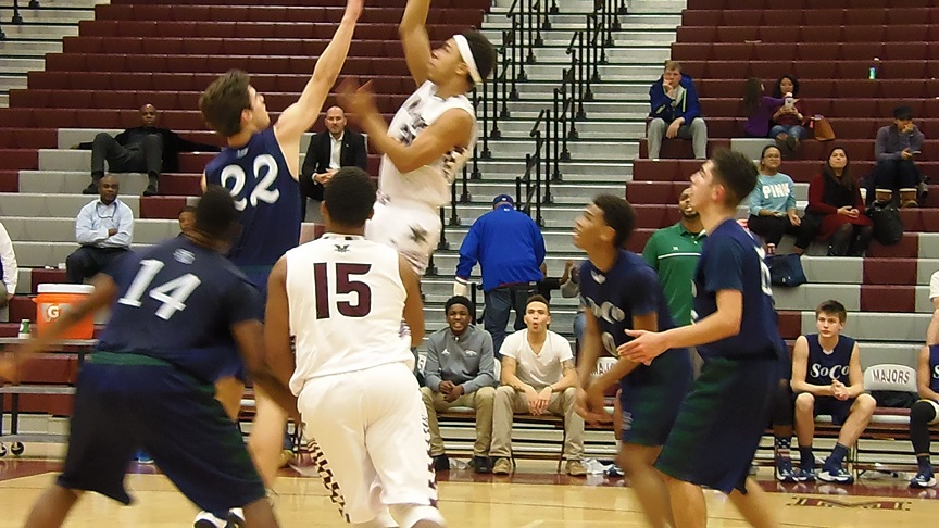 The Majors' Jonathan Hollingsworth takes a jumper as the Stallions' Ethan Snare defends.