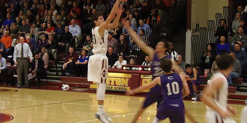 Oakton's Braeden Johnson drains two of his game-high 23 points.