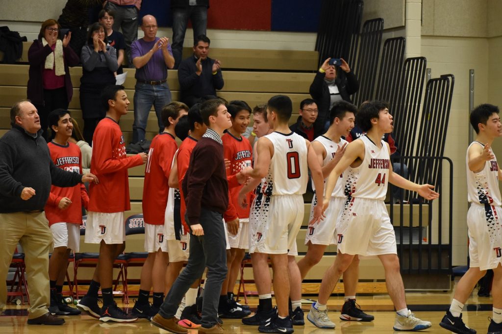 The TJ bench was all smiles after the victory.