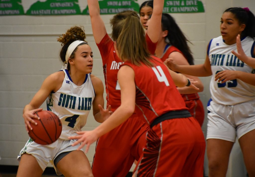 South Lakes' Nina Boffman (18 points) drives against the McLean zone.