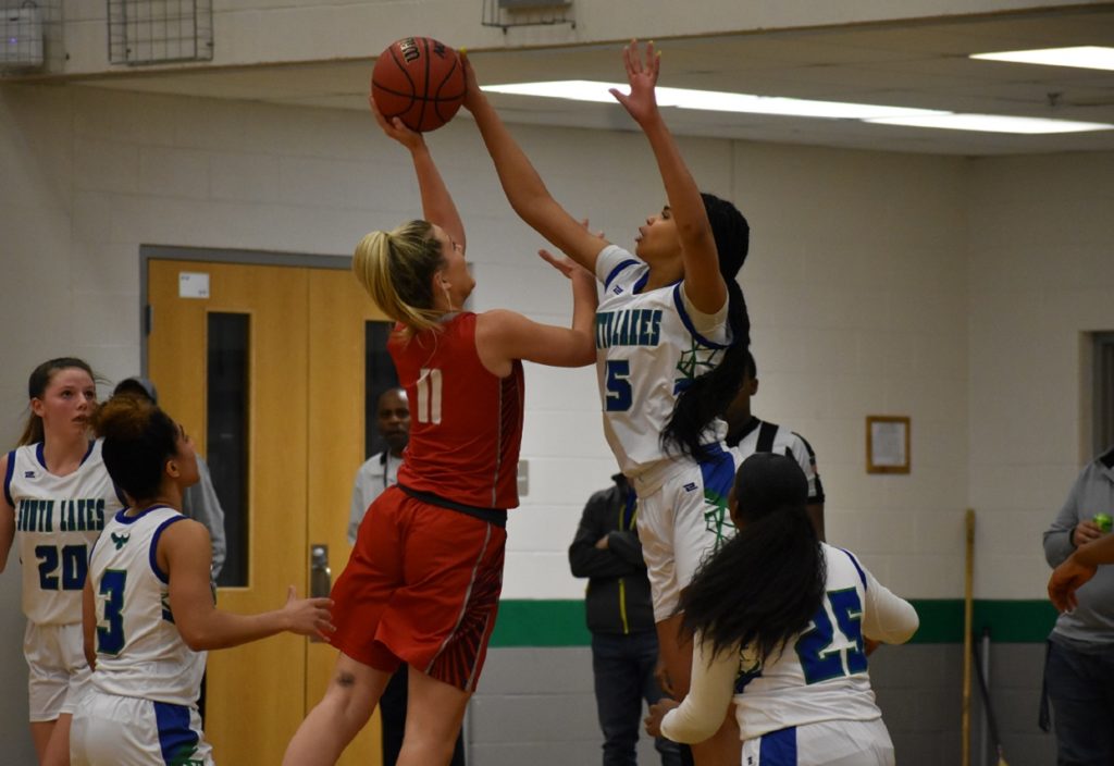 South Lakes' Brianna Scott met McLean players at the rim all night long.