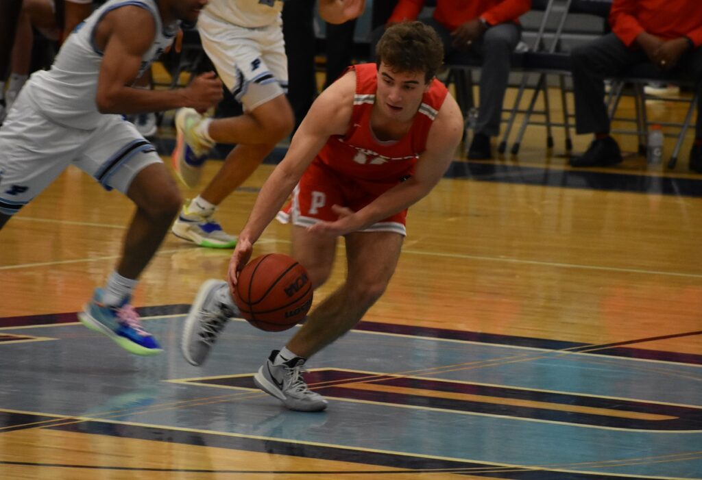 Patriot senior Mike Ackerman (14 points) gets the steal, and then the bucket.