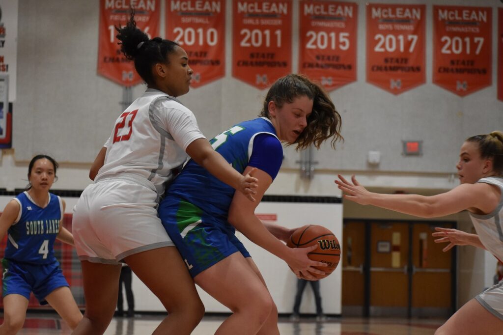 The McLean defense prepares to converge on the Seahawks' Jessica Dornak (14 points, 10 rebounds) in the post.