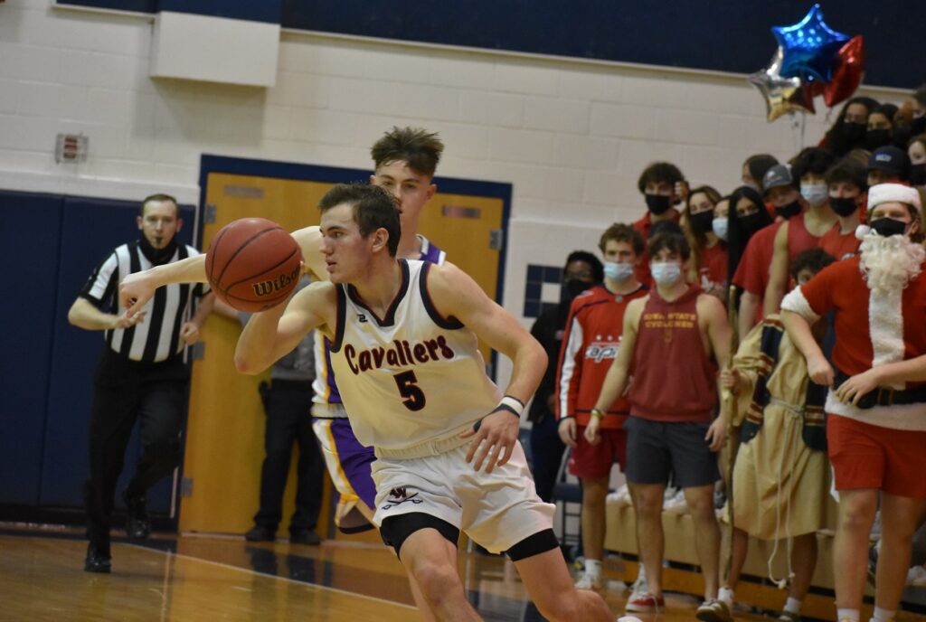Woodson senior Brady Lencz celebrated senior night in a big way, delivering 20 points and 20 boards.