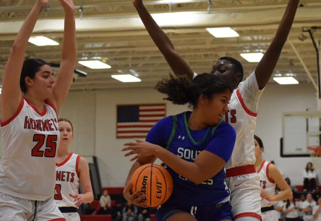 Herndon's Natalie Branson (left) and Diarra Diagne played good defense in the paint and helped control the boards.