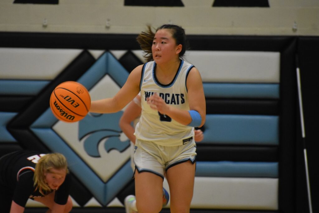 Centreville freshman Claire Kang (12 points) pushes the tempo on a fast break after a Warhawks turnover.